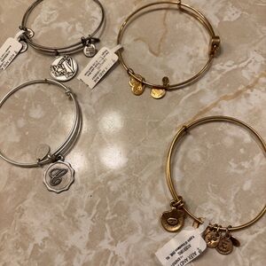 Alex and Ani Gold and Silver Charm Bracelets new never worn.